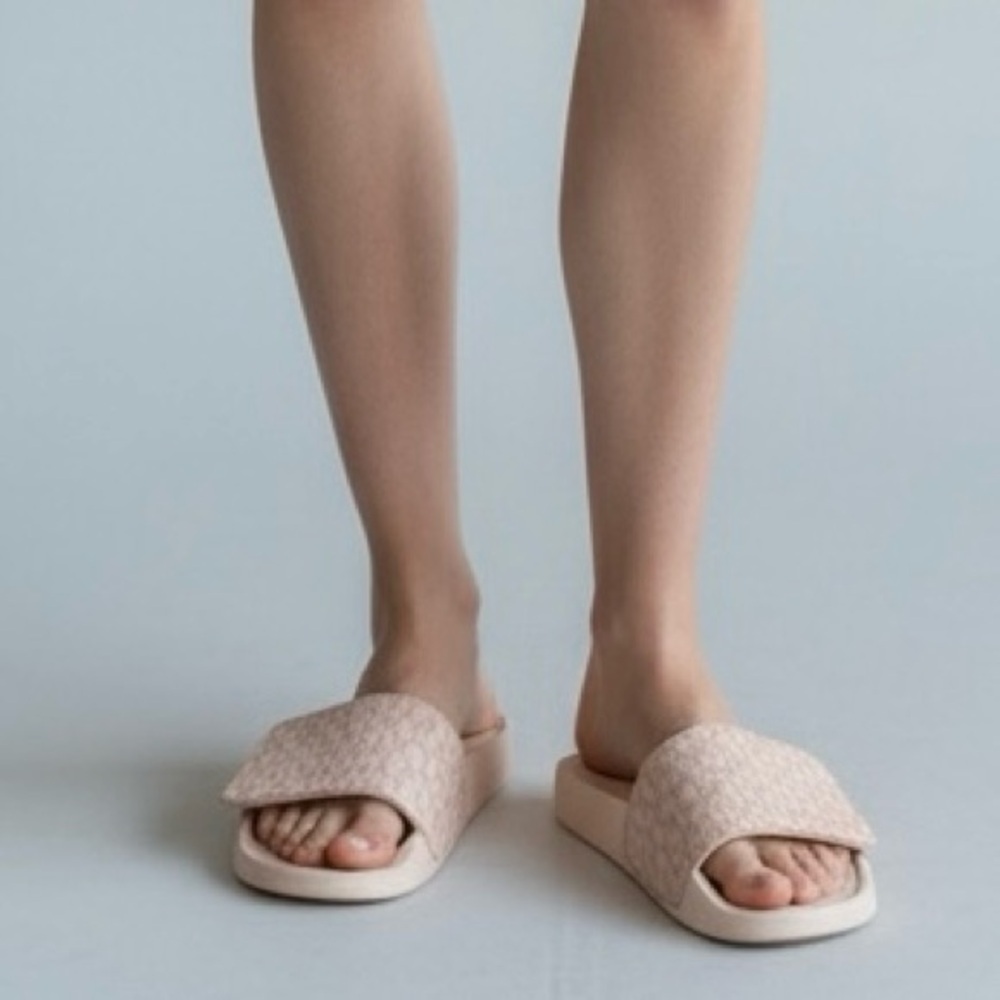 Michael Kors MK Signature Logo Print Wade Slide sandals in pink